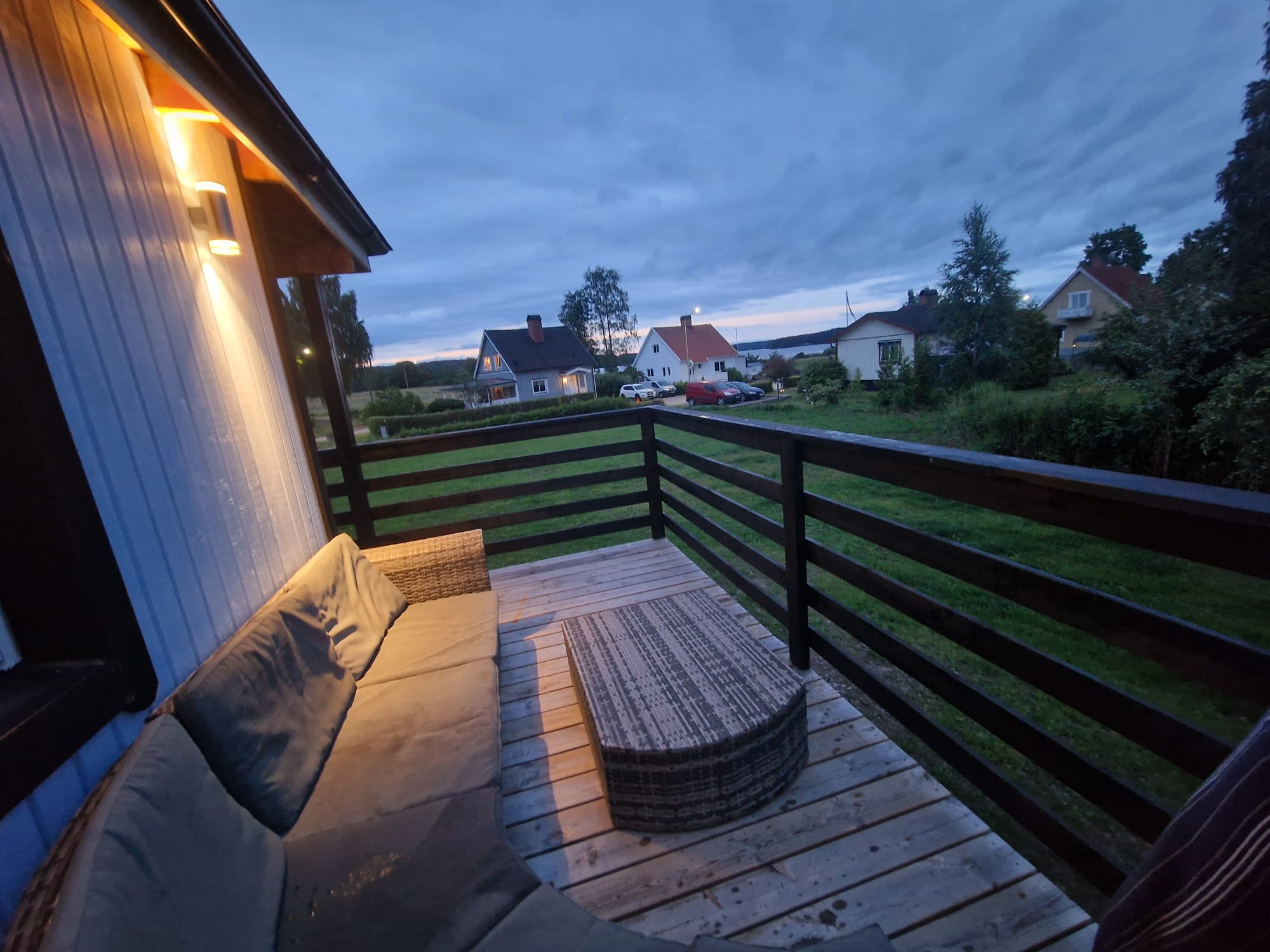 Rattan sofa on the balcony at dusk